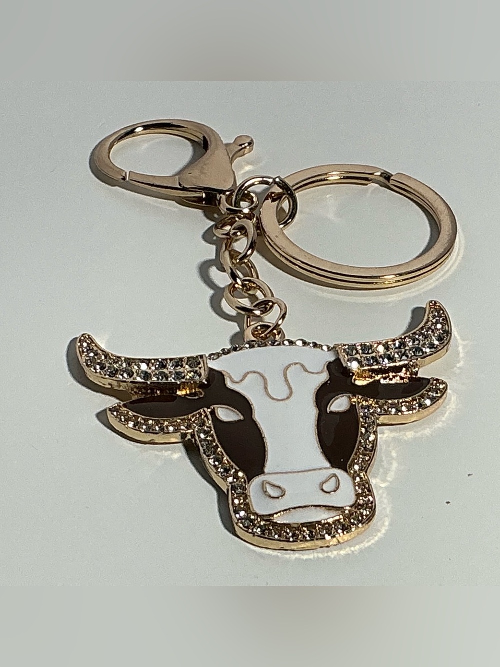 Gold-Tone Brown and White Cow Pendant Keychain with Rhinestones
